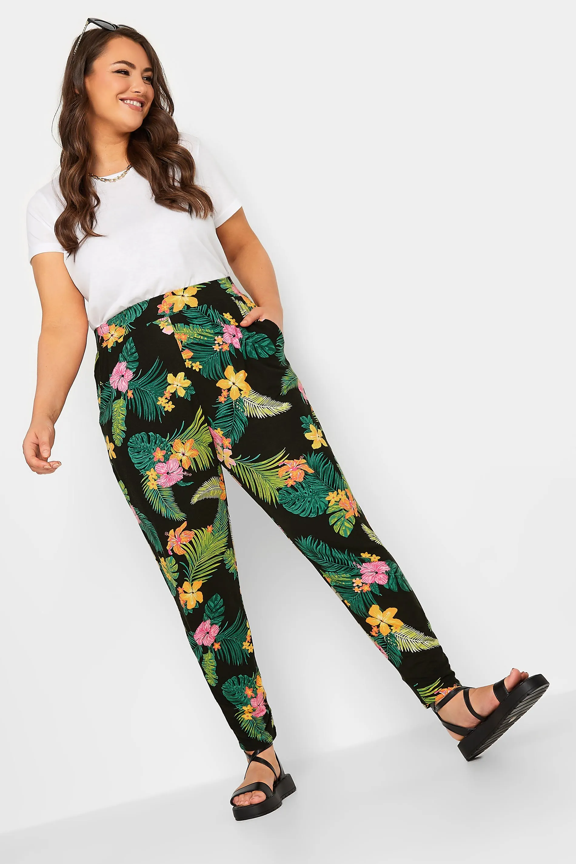 YOURS Curve Black Tropical Print Double Pleat Harem Trousers